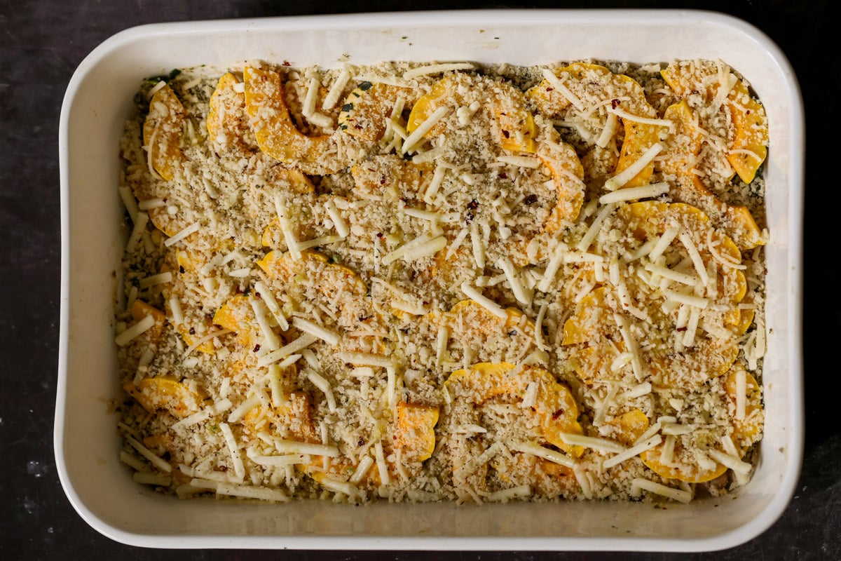 delicata squash casserole in the baking pan before baking