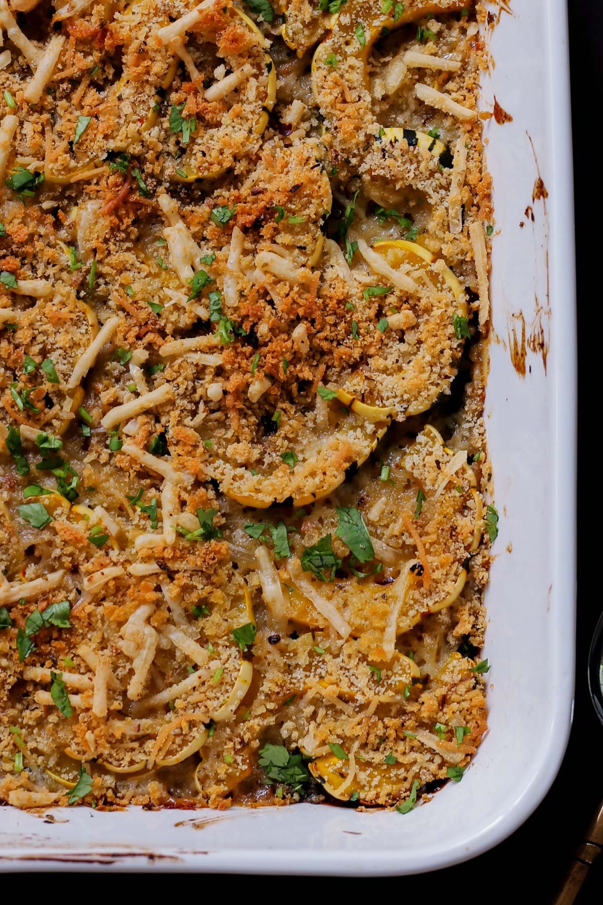 close-up of delicata squash casserole in the baking pan after baking