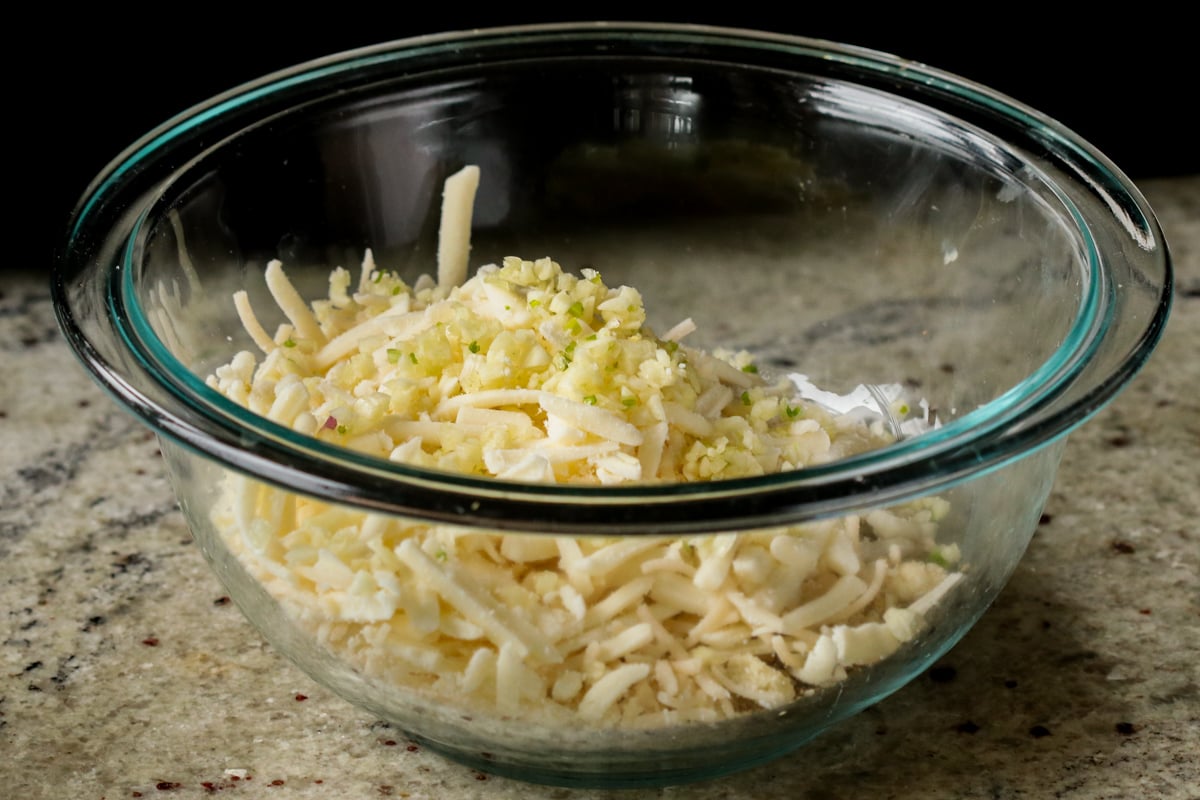 adding vegan cheese to the breadcrumbs mixture